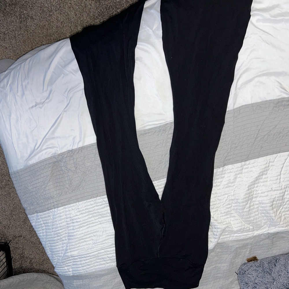 Aerie black flare leggings with cross waistline